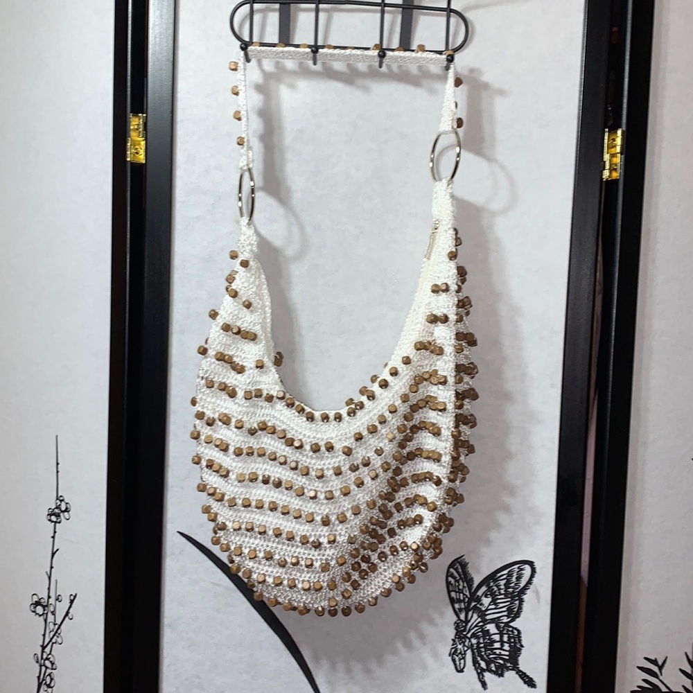 White and brown hobo bag